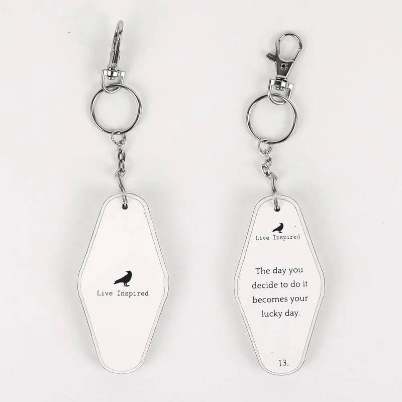 Lucky Day | white, black | 3.5×1.7x.5 rvs wd keychain | 11170